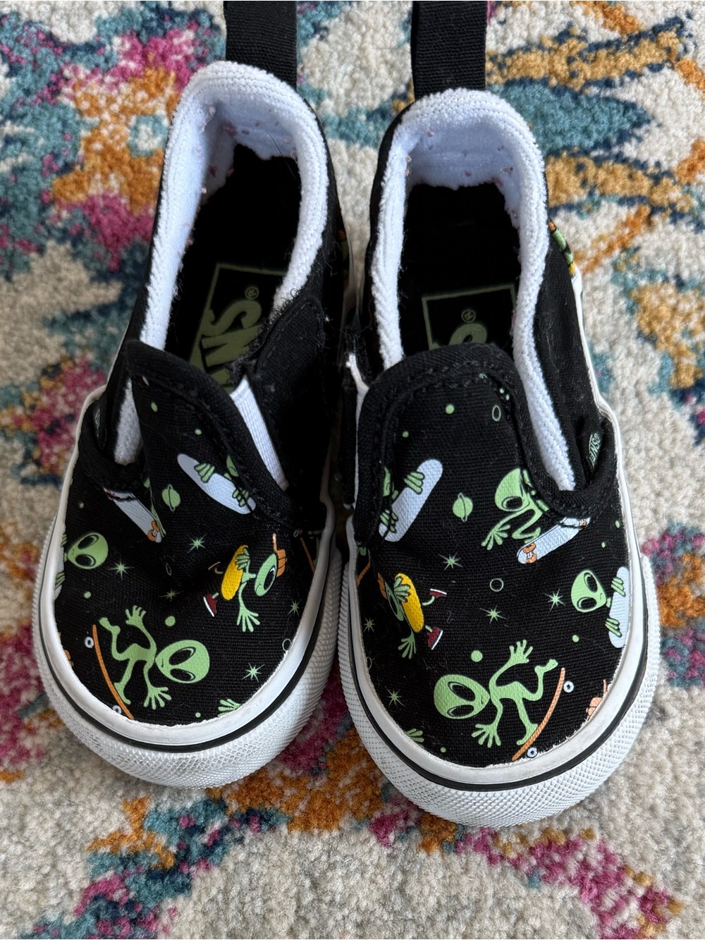 Vans Toddler Black Slip-On Sneakers with Green Alien Print
